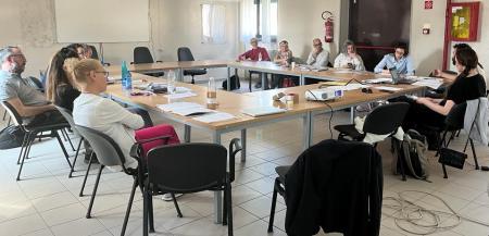 participants sitting around in a room during training